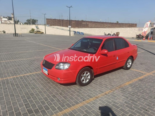 هيونداي فيرنا 2004 أحمر أوتوماتيك مستعملة للبيع في الزقازيق - 1