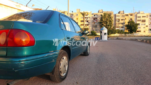 تويوتا كورولا 1999 أخضر يدوي مستعملة للبيع في الإسكندرية - 8