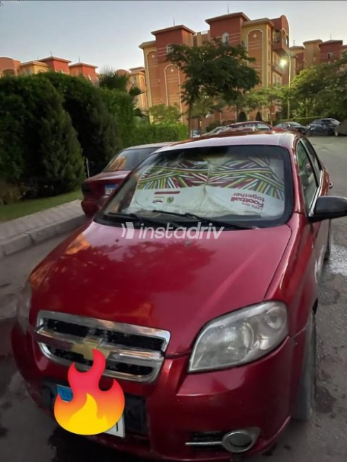 Chevrolet Aveo 2015 Red Automatic Used for Sale in Hadayek October - 1