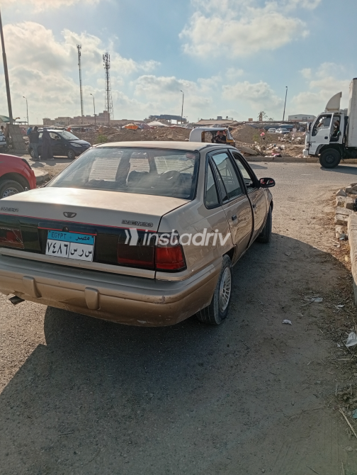 Daewoo Racer 1994 Beige Automatic Used for Sale in Alexandria - 1