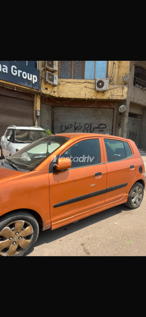 Kia Picanto 2004 Orange Manual Used for Sale in Qalyubia - 1