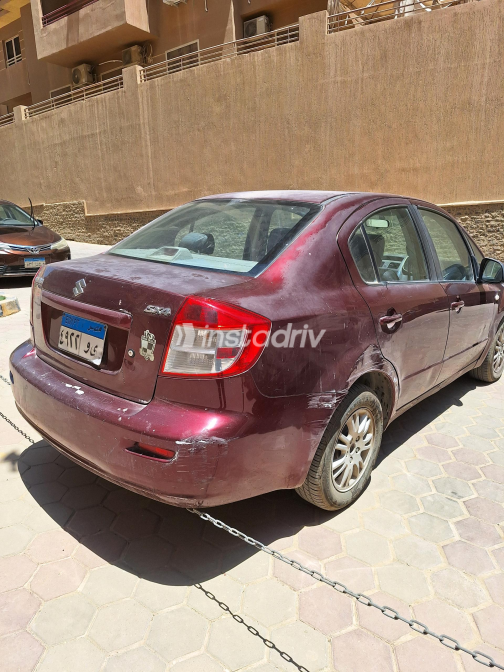سوزوكى Sx 4 2009 أبيض أوتوماتيك مستعملة للبيع في القاهرة - 1