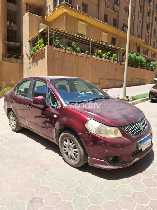 سوزوكى Sx 4 2009 أبيض أوتوماتيك مستعملة للبيع في القاهرة - 2