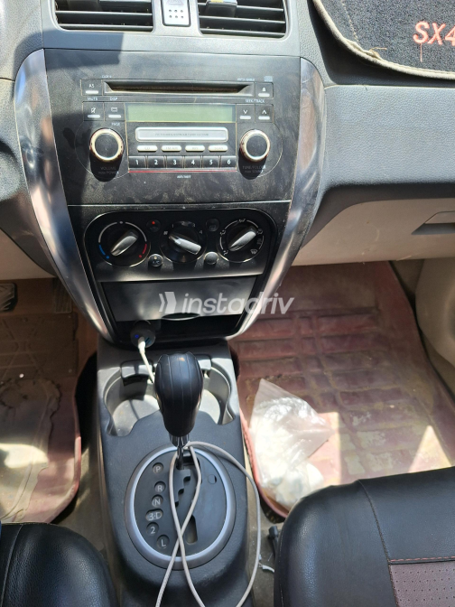 سوزوكى Sx 4 2009 أبيض أوتوماتيك مستعملة للبيع في القاهرة - 5