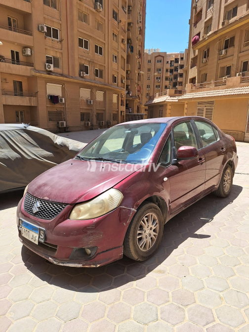 سوزوكى Sx 4 2009 أبيض أوتوماتيك مستعملة للبيع في القاهرة - 6