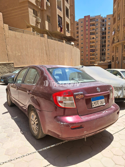 سوزوكى Sx 4 2009 أبيض أوتوماتيك مستعملة للبيع في القاهرة - 9