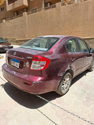 سوزوكى Sx 4 2009 أبيض أوتوماتيك مستعملة للبيع في القاهرة