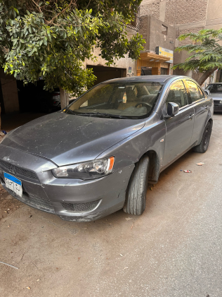 ميتسوبيشي لانسر 2015 رمادي أوتوماتيك مستعملة للبيع في الجيزة