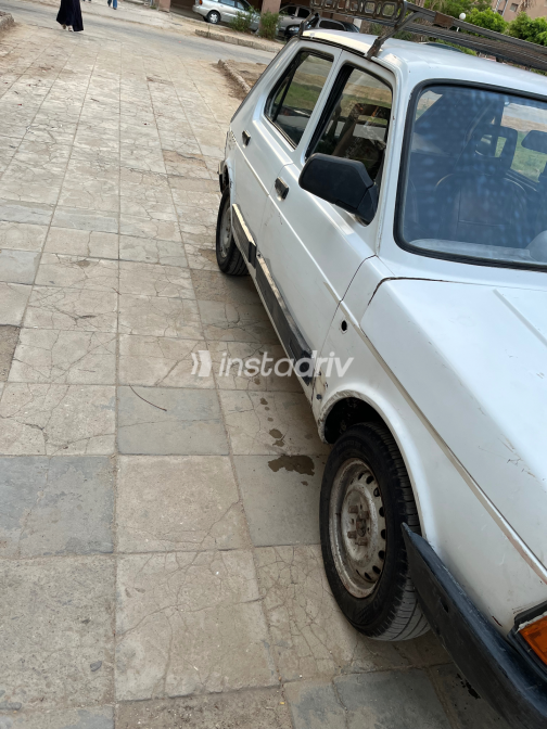 فيات 127 1987 أبيض يدوي مستعملة للبيع في الجيزة - 1