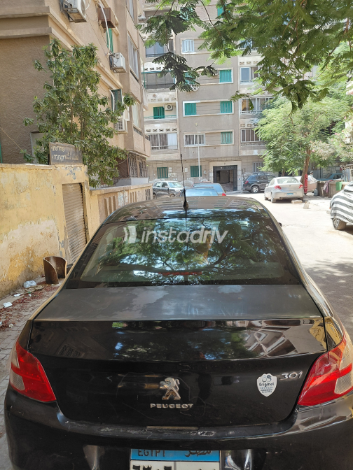 بيجو 301 2015 أسود أوتوماتيك مستعملة للبيع في مدينتى - 9