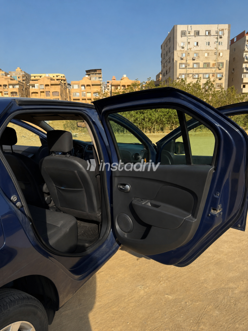 رينو لوجان 2020 أبيض أوتوماتيك مستعملة للبيع في المقطم - 10