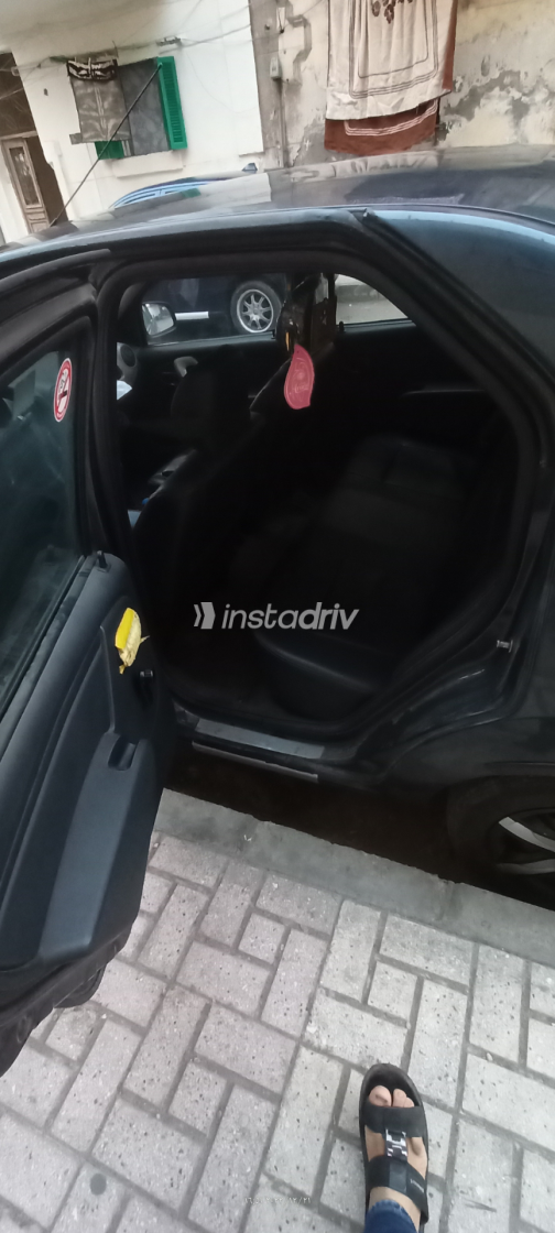 Renault Logan 2012 Gray Manual Used for Sale in Greater Cairo ( Cairo + Giza) - 10