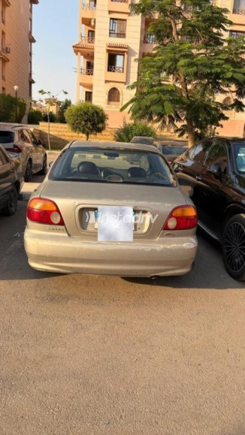 Kia Sephia 2001 Gold Automatic Used for Sale in Greater Cairo ( Cairo + Giza) - 1
