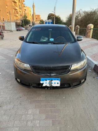Kia Cerato 2010 Mocha Automatic Used for Sale in Sohag