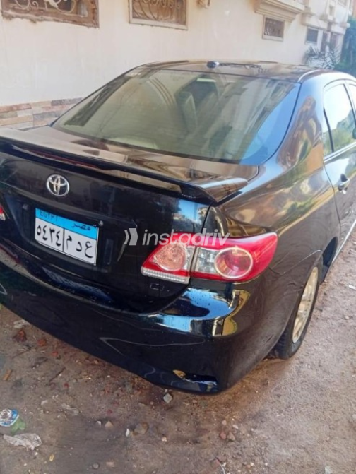 Toyota Corolla 2009 Black Automatic Used for Sale in Dyarb Negm - 4