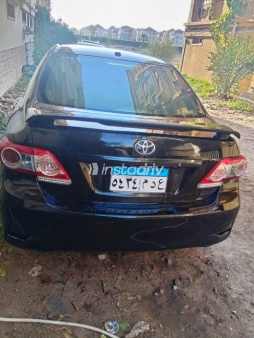 Toyota Corolla 2009 Black Automatic Used for Sale in Dyarb Negm - 6