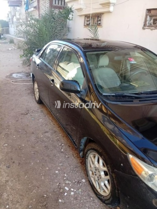 Toyota Corolla 2009 Black Automatic Used for Sale in Dyarb Negm - 7