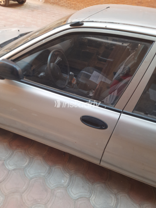 Mitsubishi Lancer 1994 Silver Manual Used for Sale in Greater Cairo ( Cairo + Giza) - 2