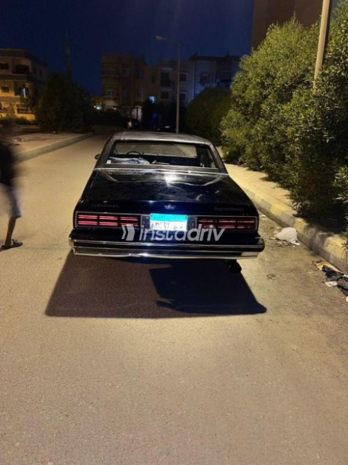 شيفروليه كابرس 1987 أسود أوتوماتيك مستعملة للبيع في 6 أكتوبر - 1