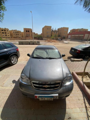 شيفروليه أوبترا 2009 رمادي غامق أوتوماتيك مستعملة للبيع في القاهرة