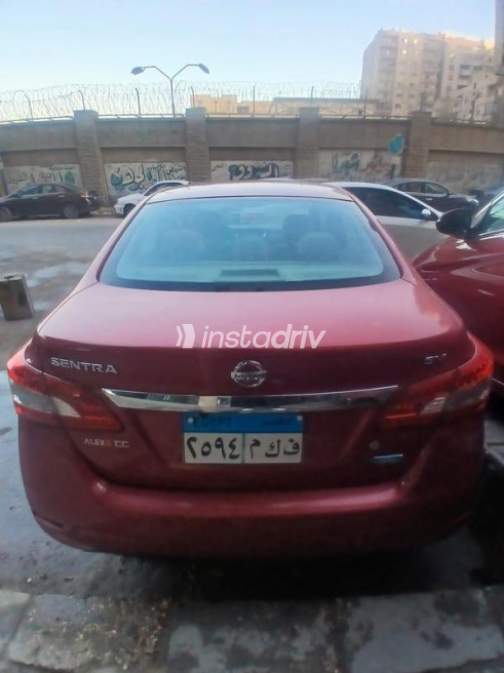 Nissan Sentra 2023 Dark Red Automatic Used for Sale in El Haram - 1