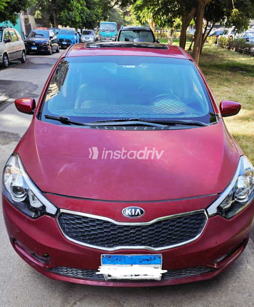 كيا سيراتو 2015 أبيض أوتوماتيك مستعملة للبيع في القاهرة الكبرى ( القاهرة - الجيزة) - 1