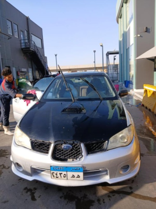 سوبارو امبريزا 2006 أبيض أوتوماتيك مستعملة للبيع في حدائق اكتوبر
