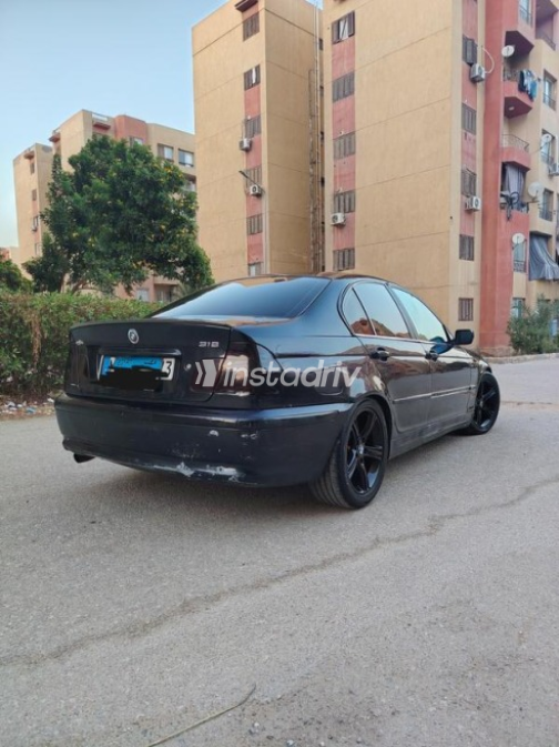 بي ام دبليو 318 2001 أسود أوتوماتيك مستعملة للبيع في القاهرة - 4