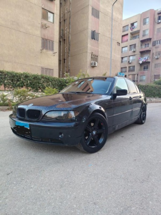 بي ام دبليو 318 2001 أسود أوتوماتيك مستعملة للبيع في القاهرة