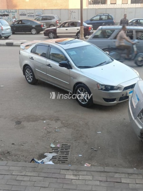 ميتسوبيشي لانسر اى اكس شارك 2015 فضي أوتوماتيك مستعملة للبيع في المحلة - 1
