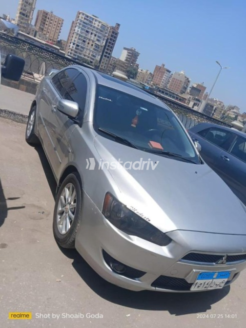 ميتسوبيشي لانسر اى اكس شارك 2015 فضي أوتوماتيك مستعملة للبيع في المحلة - 8