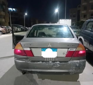 Mitsubishi Lancer 1998 Bronze Manual Used for Sale in Greater Cairo ( Cairo + Giza)