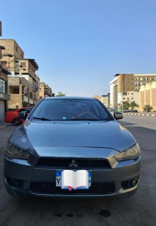 ميتسوبيشي لانسر اى اكس شارك 2016 فضي أوتوماتيك مستعملة للبيع في القاهرة