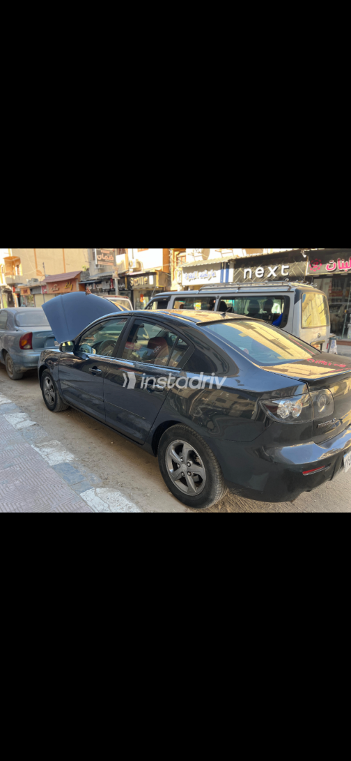 مازدا 323 2027 أسود أوتوماتيك مستعملة للبيع في القاهرة الكبرى ( القاهرة - الجيزة) - 2