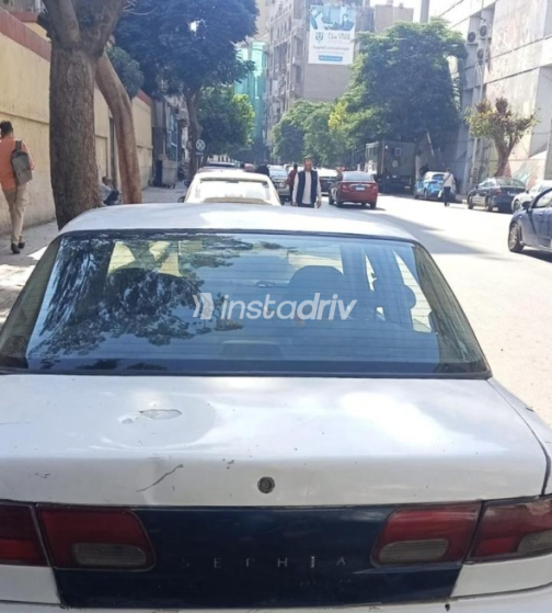 Kia Sephia 1995 White Automatic Used for Sale in Greater Cairo ( Cairo + Giza) - 1