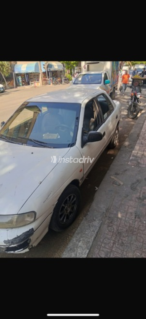 Kia Sephia 1995 White Automatic Used for Sale in Greater Cairo ( Cairo + Giza) - 5