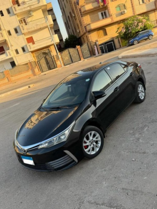 تويوتا كورولا 2019 أسود أوتوماتيك مستعملة للبيع في القاهرة