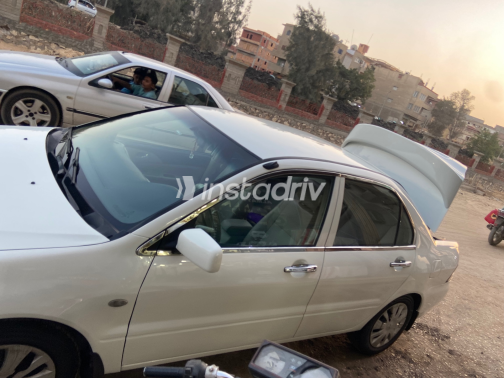 Mitsubishi Lancer Puma 2005 White Automatic Used for Sale in Greater Cairo ( Cairo + Giza) - 5