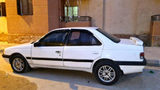 بيجو 405 1996 أبيض أوتوماتيك مستعملة للبيع في الإسكندرية