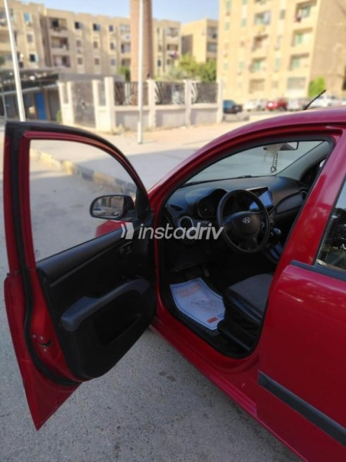 هيونداي I10 2015 أحمر أوتوماتيك مستعملة للبيع في القاهرة - 2