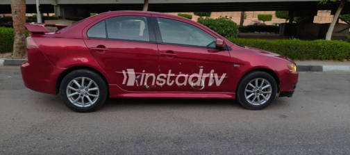 ميتسوبيشي لانسر 2016 أحمر غامق أوتوماتيك مستعملة للبيع في القاهرة الكبرى ( القاهرة - الجيزة) - 4