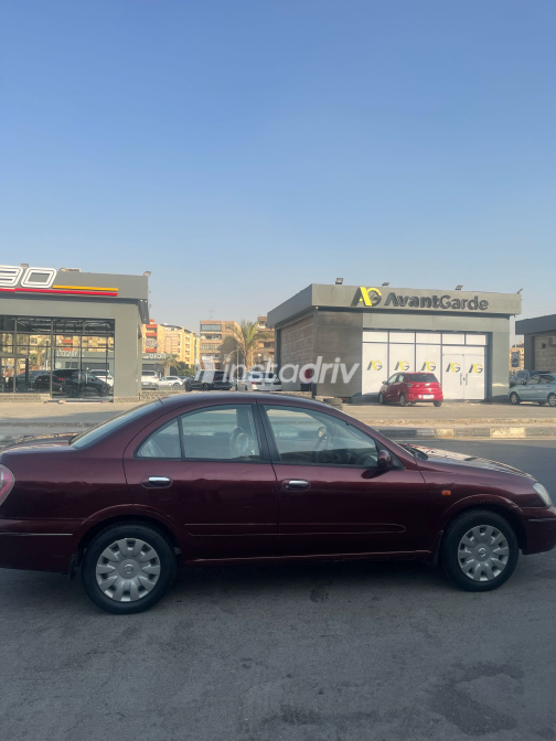 Nissan Sunny 2009 White Automatic Used for Sale in Greater Cairo ( Cairo + Giza) - 3