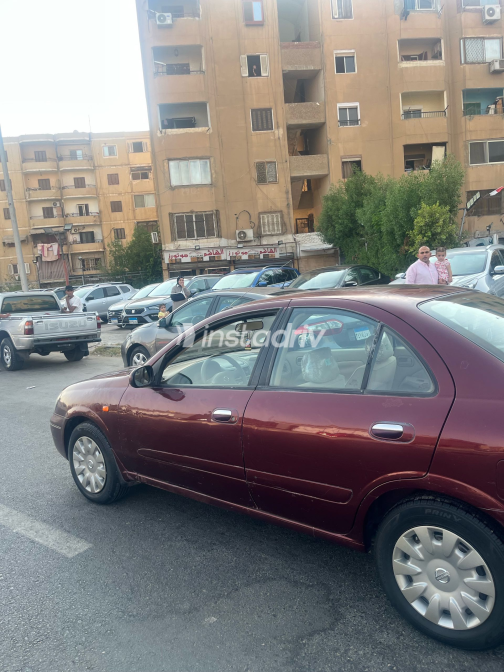 Nissan Sunny 2009 White Automatic Used for Sale in Greater Cairo ( Cairo + Giza) - 4