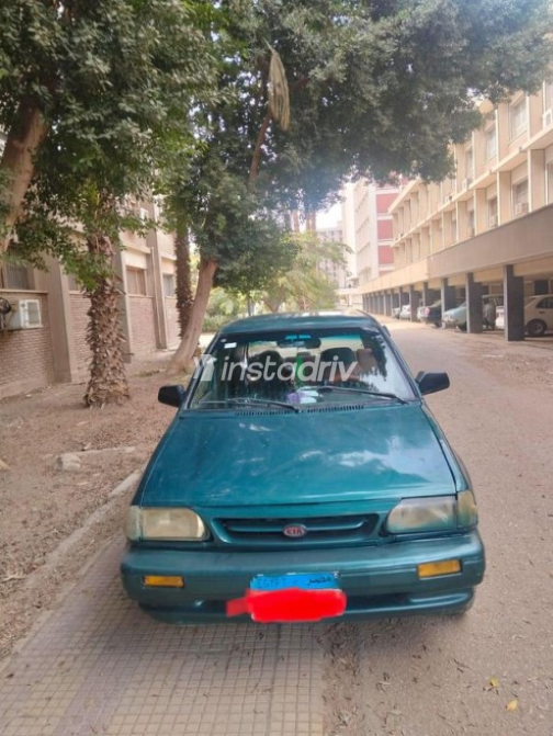 كيا برايد 1999 أخضر غامق أوتوماتيك مستعملة للبيع في أسيوط - 1