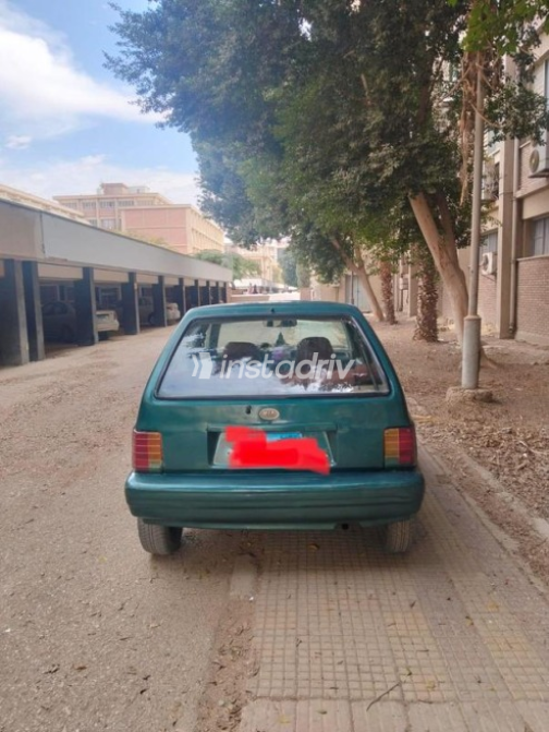 كيا برايد 1999 أخضر غامق أوتوماتيك مستعملة للبيع في أسيوط - 2