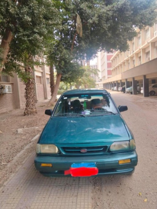كيا برايد 1999 أخضر غامق أوتوماتيك مستعملة للبيع في أسيوط