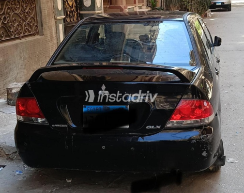 ميتسوبيشي لانسر بومة 2005 أسود أوتوماتيك مستعملة للبيع في المنصورة - 1