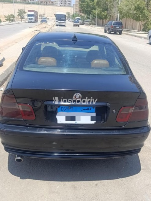 بي ام دبليو 318 2005 أسود أوتوماتيك مستعملة للبيع في القاهرة - 7