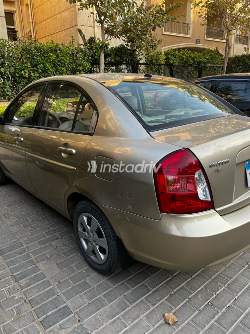 هيونداي اكسنت 2009 ذهبي يدوي مستعملة للبيع في القاهرة الكبرى ( القاهرة - الجيزة) - 1