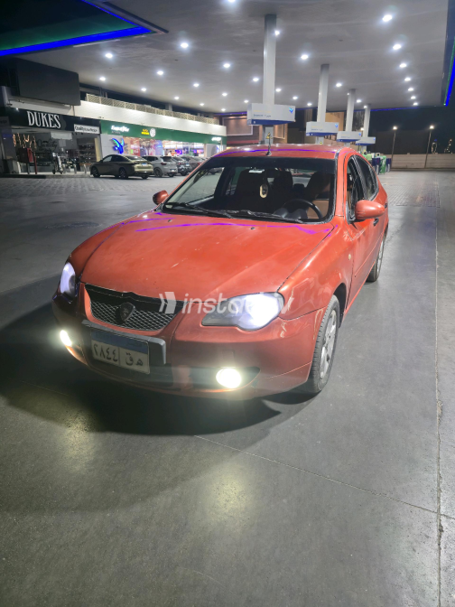 Proton Gen 2 2010 Orange Automatic Used for Sale in Greater Cairo ( Cairo + Giza) - 3